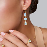 Oval Cut Sky Blue Topaz Gemstone & Diamond Bezel Triple Drop Earrings