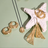 Threaded Gold and Silver Pebble Pendant Necklace
